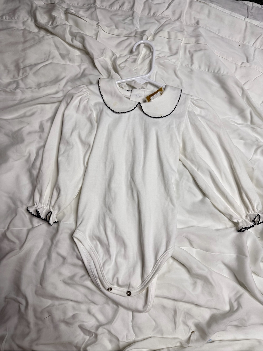 The Beaufort Bonnet Company White Long-Sleeve Baby One-Piece with Black Trim
